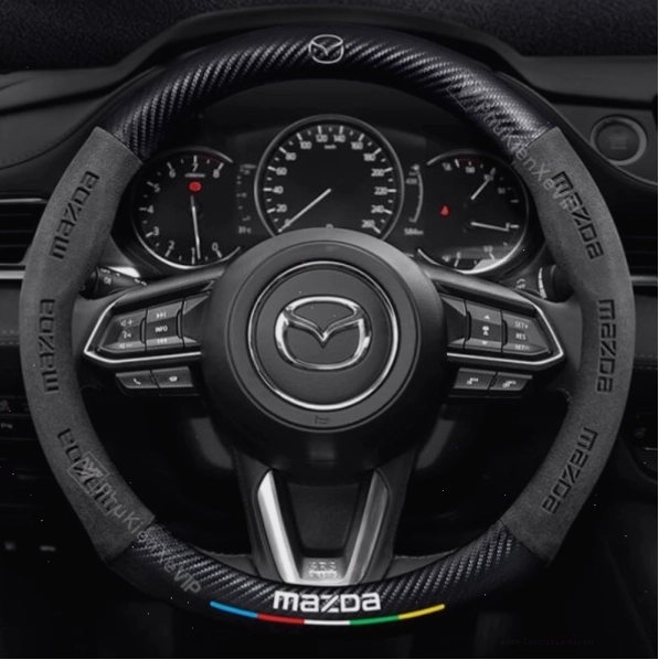 Bọc vô lăng da lộn sợi Carbon cho xe Mazda