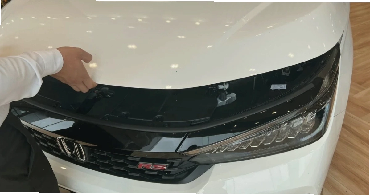 Đóng nắp capo xe Honda