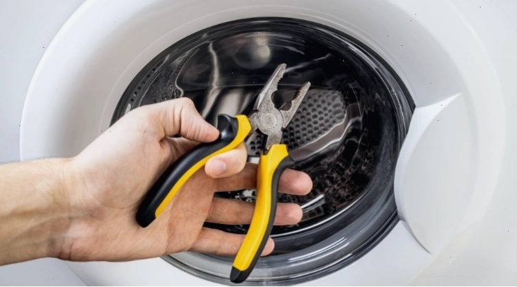 Lắp vòng bi mới vào trục máy giặt